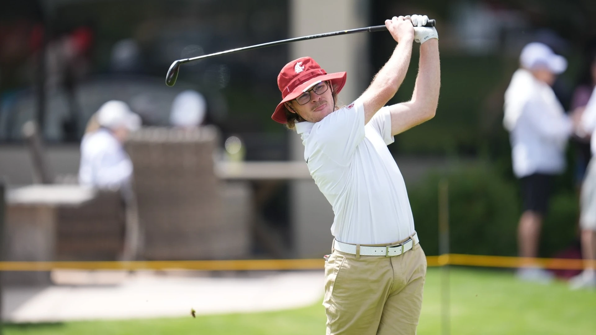 Preston Bebich mid-swing for Washington State